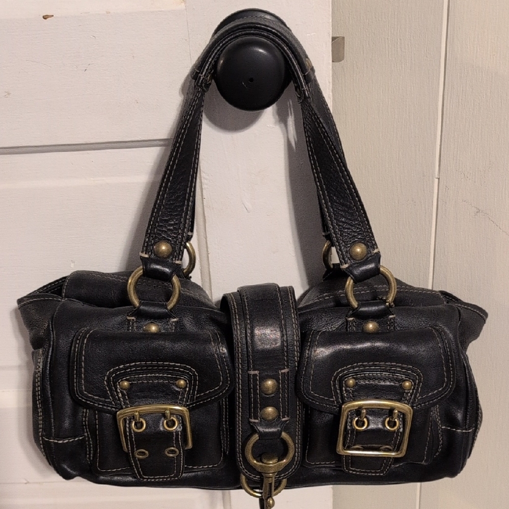 This is a limited edition Coach Legacy 65th Anniversary Mandy satchel in black